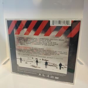 CD U2 - How To Dismantle An....